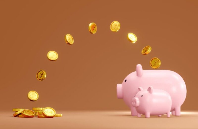 coins jump into piggy bank