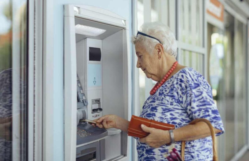 customer uses bank ATM