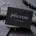 Micron DDR5 8200 memory chip displayed among semiconductor components.